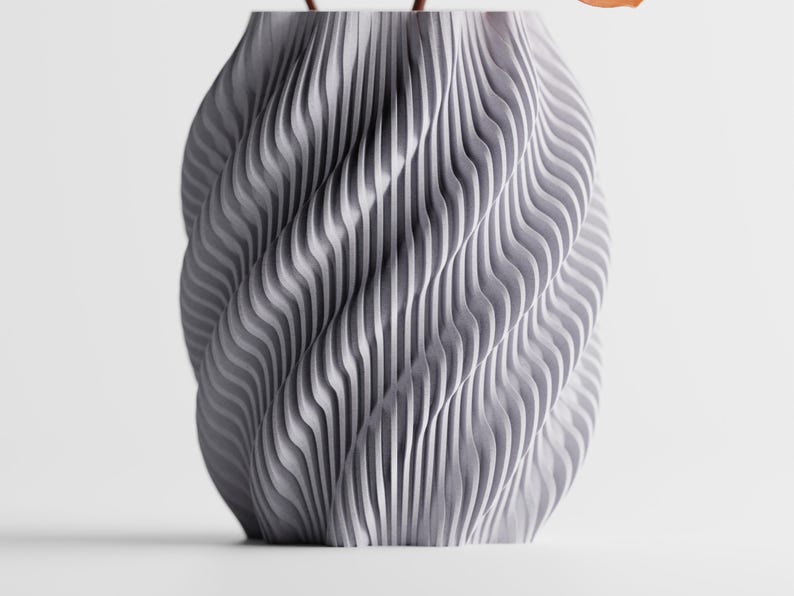 Moderne, dynamisch rotierende 3D-gedruckte Wasserwellenvase
